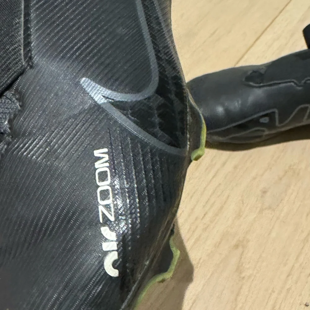 Nike Kids Black Soccer Cleats with Gray Swoosh